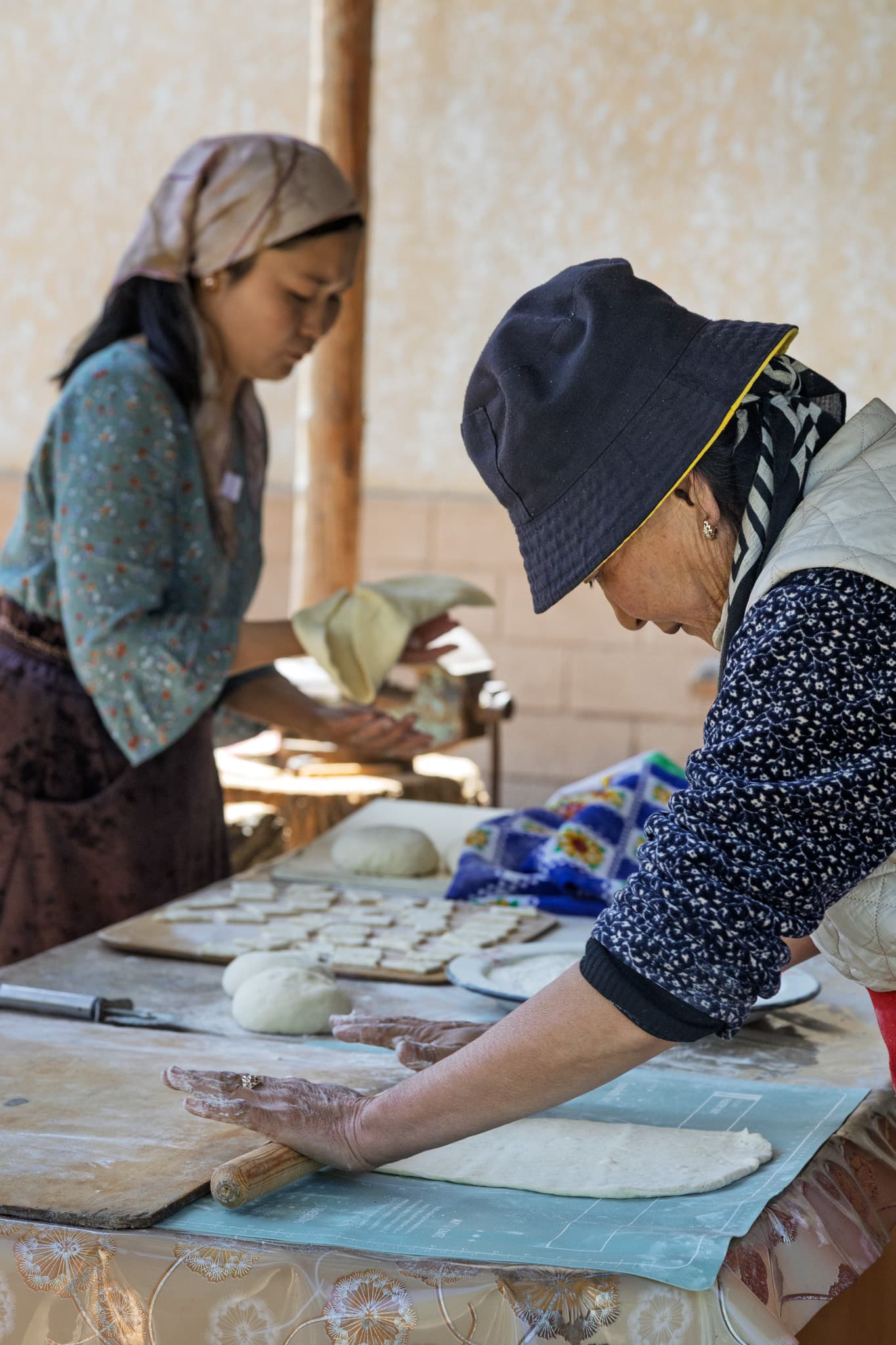Two women preparing borsok